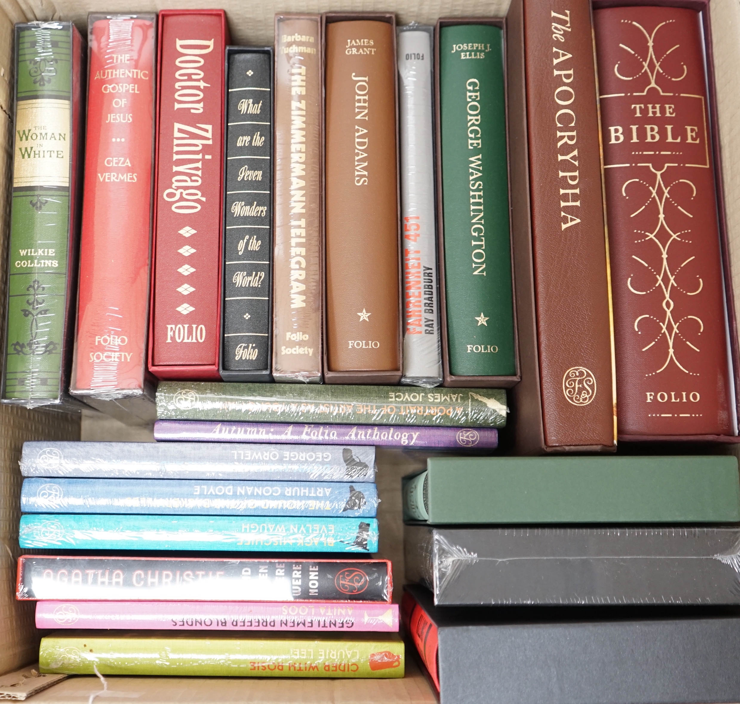 Twenty one Folio Society books, mostly fiction, including Waugh, Brideshead Revisited; Doctor Zhivago; The Woman in White; The Bible; Thr Apocrypha, etc.